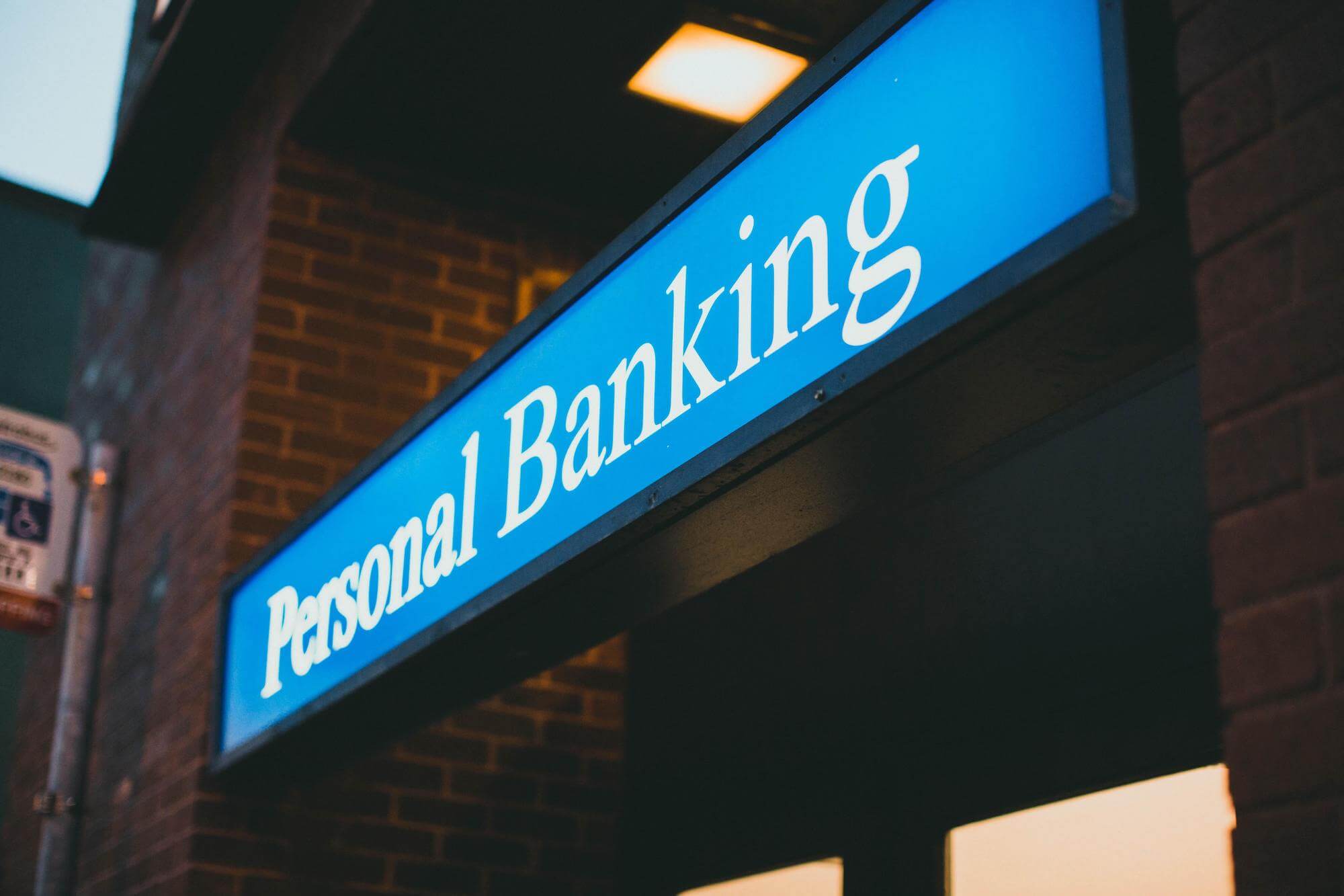 A sign on a bank saying "personal banking"